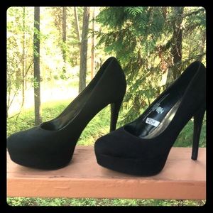 Xhiliration black stiletto heels.